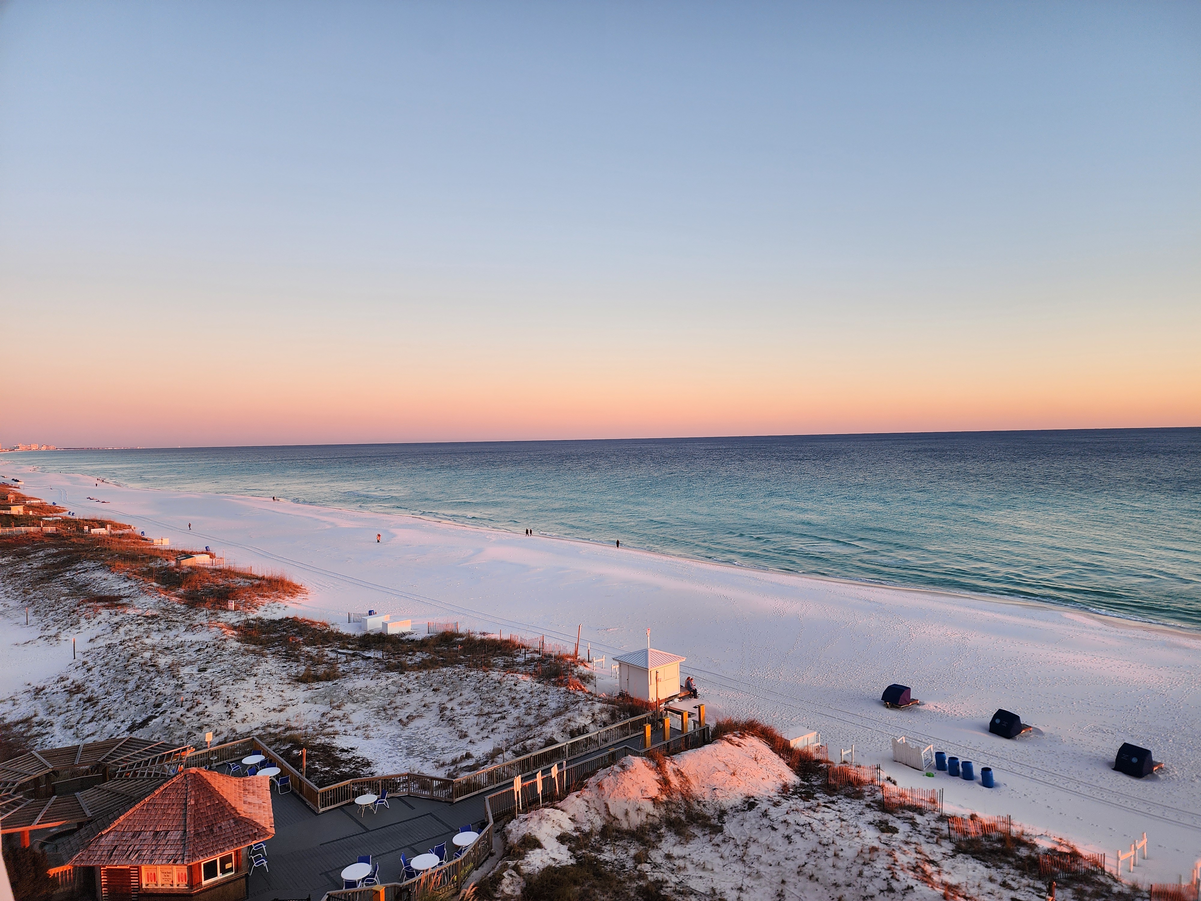Pastel evening light over the Gulf and white-sand beach in Destin