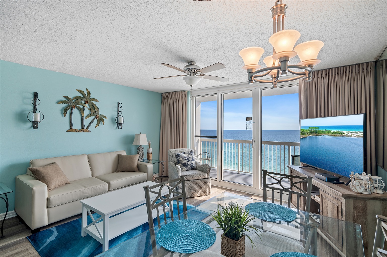 Gulf-facing view and interior of Pelican Beach Resort Unit 1006